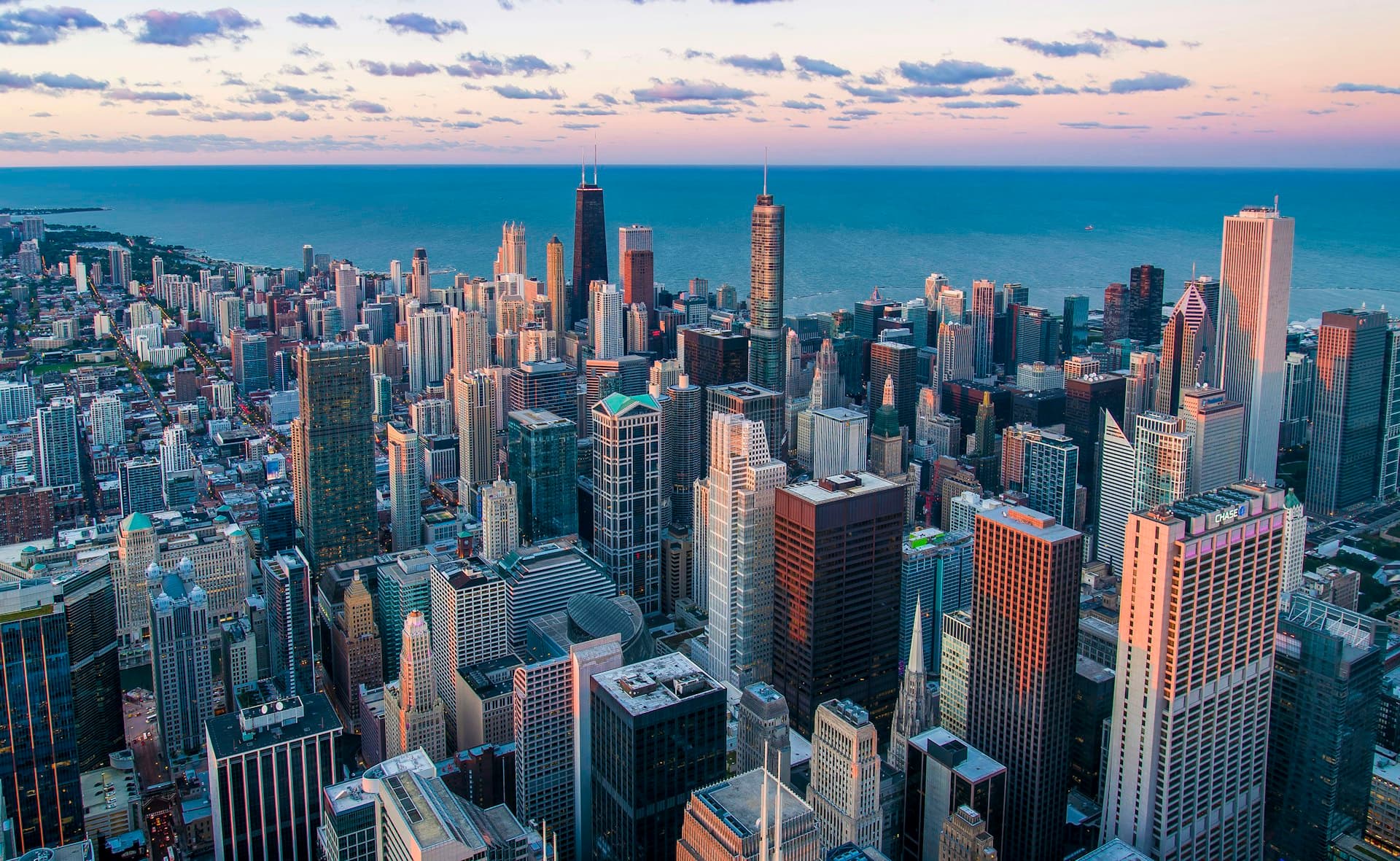Chicago skyline illuminated at night along the lakefront
